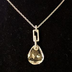 Swarovski necklace with large crystal pendant.